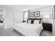 Neutral bedroom with carpet, neutral walls and a window with patterned curtains at 70 Saintsbury Dr, Fuquay Varina, NC 27526