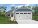 Charming single-story home with a two-car garage, well-manicured lawn, and appealing curb appeal at 70 Saintsbury Dr, Fuquay Varina, NC 27526