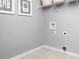 Laundry room with white walls and a storage shelf at 70 Saintsbury Dr, Fuquay Varina, NC 27526