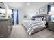 Serene main bedroom featuring carpeted floors, with light blue walls and modern furniture at 70 Saintsbury Dr, Fuquay Varina, NC 27526