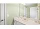 Bathroom with vanity, sink, mirror, and toilet at 1004 Dunleigh Dr, Burlington, NC 27215
