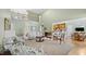 Spacious living room with high ceilings, neutral decor, and an open layout to the kitchen at 1004 Dunleigh Dr, Burlington, NC 27215