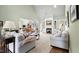Bright and airy living room with a fireplace, comfortable seating, and views of the breakfast nook at 1004 Dunleigh Dr, Burlington, NC 27215