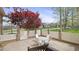 Patio area with table and chairs, perfect for outdoor relaxation at 1004 Dunleigh Dr, Burlington, NC 27215
