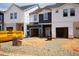 New construction townhomes showcase unfinished exteriors, awaiting final touches and landscaping at 1045 Winding Spring Dr, Mebane, NC 27302