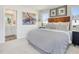 Comfortable bedroom features a queen-size bed, stylish decor, and an en-suite bathroom for privacy at 1047 Winding Spring Dr, Mebane, NC 27302