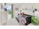 Charming bedroom with playful decor, a daybed, and a bright window view at 1051 Winding Spring Dr, Mebane, NC 27302