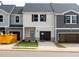 New construction townhomes with attached garages and craftsman-style details at 1051 Winding Spring Dr, Mebane, NC 27302