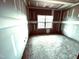 Unfinished bedroom with natural light streaming through a window at 1085 Fairhaven Dr # 49, Mebane, NC 27302