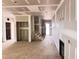 Unfinished living room with fireplace and stairway; ready for customization at 1085 Fairhaven Dr # 49, Mebane, NC 27302
