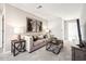 Inviting living room with comfortable seating, neutral decor, and carpet flooring at 1085 Fairhaven Dr # 49, Mebane, NC 27302