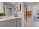 Stylish bathroom with a gray vanity, white countertop, and a shower-tub combo for a modern look at 1125 Sun Springs Rd, Wake Forest, NC 27587