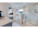 Bathroom showcases a glass-enclosed shower and soaking tub with window views at 1125 Sun Springs Rd, Wake Forest, NC 27587