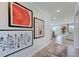 Hallway with modern art and beautiful floors at 1125 Sun Springs Rd, Wake Forest, NC 27587