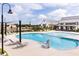 A large community pool with sun loungers and accessibility features, perfect for all residents to enjoy at 1125 Sun Springs Rd, Wake Forest, NC 27587