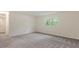 Spacious bedroom features neutral carpet, one window, and ample natural light at 1217 Manassas Ct # H, Raleigh, NC 27615