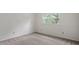 Cozy bedroom with neutral walls, plush carpet, and a double window allowing ample natural light at 1217 Manassas Ct # H, Raleigh, NC 27615