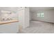 Open floorplan showing the eat in kitchen, living room and view to the outside at 1217 Manassas Ct # H, Raleigh, NC 27615