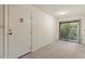 Inviting room with neutral carpet, one door and one window flood space with light at 1217 Manassas Ct # H, Raleigh, NC 27615