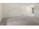 Spacious living room with entrance door at 1217 Manassas Ct # H, Raleigh, NC 27615