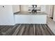 Contemporary kitchen with stainless steel appliances and a center island with granite countertops at 136 N Keatts Winner Ct, Clayton, NC 27520