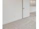 Carpeted bedroom features a door leading to another room at 149 Whimbrel Ct, Lillington, NC 27546
