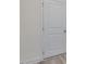 Neutral-painted door with white trim and modern hardware at 149 Whimbrel Ct, Lillington, NC 27546