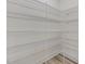Bright pantry with wooden floors and white wire shelving for optimal storage at 149 Whimbrel Ct, Lillington, NC 27546