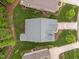 Aerial shot showcases the home's roof, manicured lawn, and meticulously maintained landscaping at 1620 Hasentree Villa Ln, Wake Forest, NC 27587