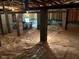 Unfinished basement with concrete pillars and plastic ground cover, ready for customization and potential expansion at 1620 Hasentree Villa Ln, Wake Forest, NC 27587