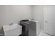 Functional laundry room with a sink, washer, and dryer for convenience at 1620 Hasentree Villa Ln, Wake Forest, NC 27587