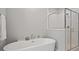 Modern bathroom with soaking tub and glass shower, offering a spa-like experience at 1733 Birdhaven Ln # 2217, Wendell, NC 27591