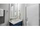 Bathroom featuring a modern vanity with quartz countertop, sleek fixtures, a walk-in shower, and contemporary finishes at 1733 Birdhaven Ln # 2217, Wendell, NC 27591