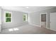 Spacious bedroom with carpeted floors, and natural light at 1733 Birdhaven Ln # 2217, Wendell, NC 27591