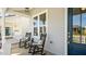 Charming front porch with rocking chairs and a view of the neighborhood at 1733 Birdhaven Ln # 2217, Wendell, NC 27591