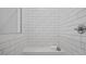Glass shower with clean, white subway tile and a built-in bench at 1733 Birdhaven Ln # 2217, Wendell, NC 27591