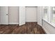 Bedroom showcasing hardwood floors and a window at 186 N Ashe Ave, Dunn, NC 28334