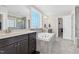 A spacious bathroom with a soaking tub, walk-in shower and double vanity at 2008 Campana Dr, Raleigh, NC 27603