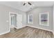 Primary bedroom with vaulted ceiling and natural light streaming in through windows at 206 Jetson Creek Way, Youngsville, NC 27596