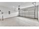 Spacious two-car garage with a concrete floor and an automatic door opener at 206 Jetson Creek Way, Youngsville, NC 27596