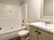 Bathroom with a shower and tub at 209 King St, Oxford, NC 27565