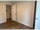 Bedroom with wood floors and a closet at 209 King St, Oxford, NC 27565