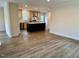 Open concept kitchen with an island and modern stainless steel appliances at 209 King St, Oxford, NC 27565
