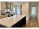 Modern kitchen with a large island and stainless steel appliances at 209 King St, Oxford, NC 27565