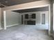 A sleek basement with a stylish wet bar, offering great potential for entertainment at 2590 Silas Peak Ln, Apex, NC 27523