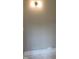 Bright bathroom featuring a modern light fixture and freshly painted walls at 2590 Silas Peak Ln, Apex, NC 27523