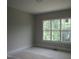 Bedroom with large windows and plenty of natural light at 2590 Silas Peak Ln, Apex, NC 27523