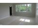 Bedroom with multiple windows allowing ample natural light to illuminate the room at 2590 Silas Peak Ln, Apex, NC 27523