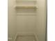 Bright closet with wooden rod and shelf offers room for clothing storage at 2590 Silas Peak Ln, Apex, NC 27523
