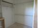 Unfinished closet with shelving and natural light at 2590 Silas Peak Ln, Apex, NC 27523